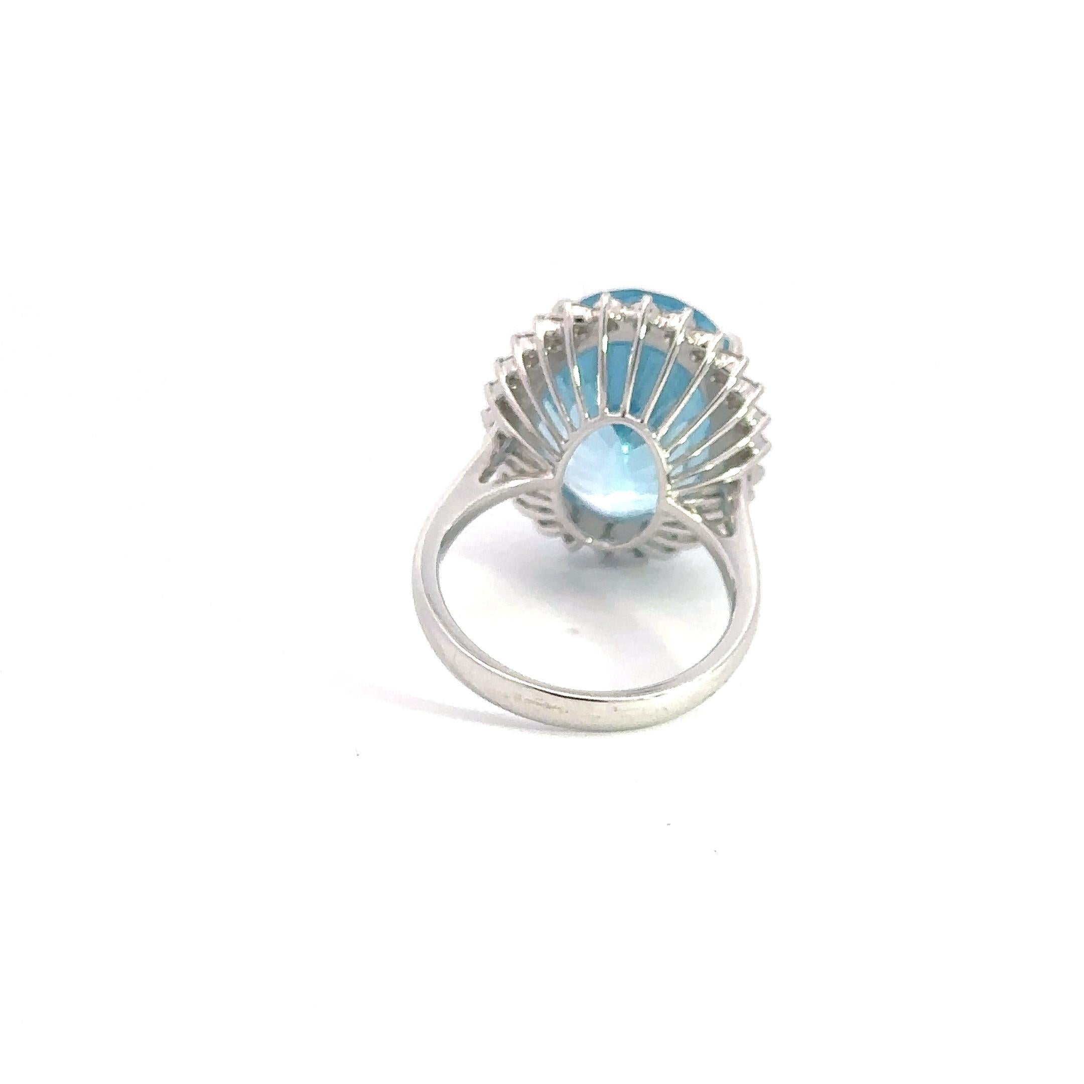 Ring

18K White Gold 

Weight 7,02 GMS 

Blue Topaz-1/19.76 Cts
Diamond-26/1.02 Cts

Size-57

Introducing a captivating masterpiece, our Blue Topaz Ring is a true embodiment of luxury and sophistication. Crafted with precision, this stunning piece