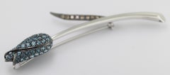 Blue Topaz, Diamond, Blackened 18k White Gold Flower Brooch