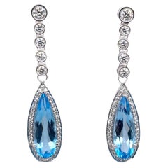 Boucles d'oreilles pendantes avec topaze bleue et diamants sertis de 2,10 carats de diamants F/VS