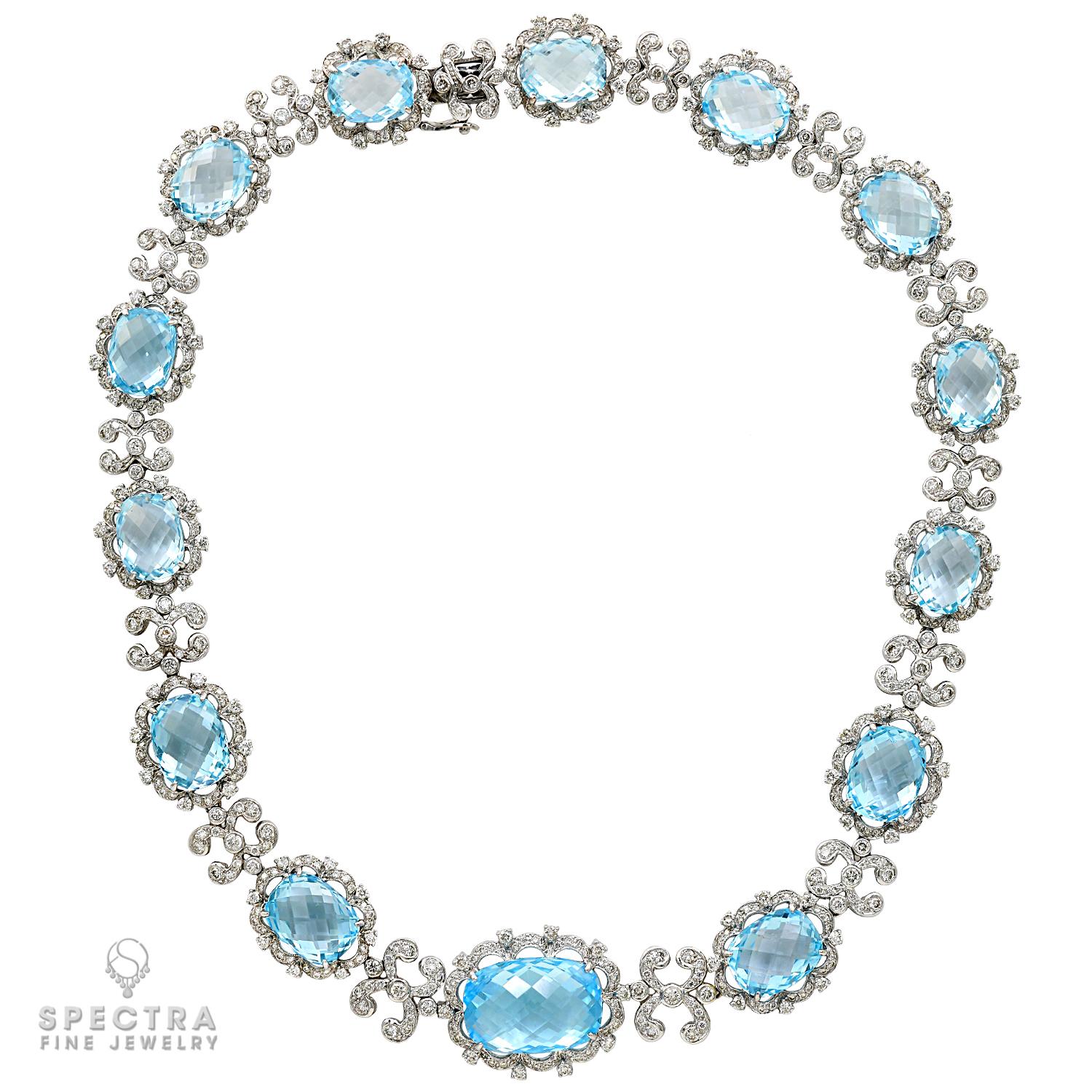 The Modern Blue Topaz Diamond 18K White Gold Necklace is a stunning piece of jewelry designed to add elegance and sophistication to any outfit. The necklace is crafted from 18K white gold, which gives it a lustrous and polished finish. The weight of