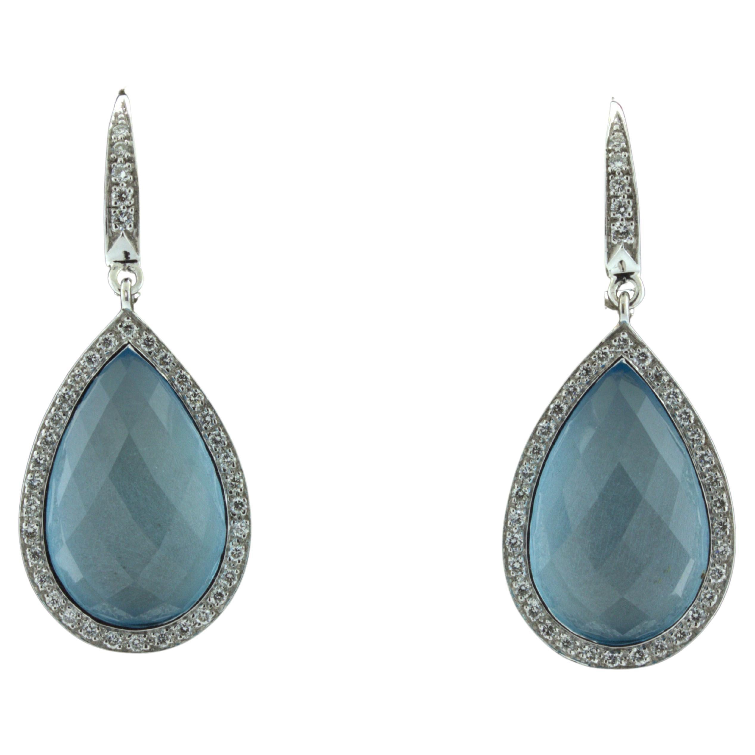 Blue Topaz Diamond Halo 18k White Gold Drop Earrings For Sale