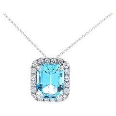 Blue topaz diamond halo necklace