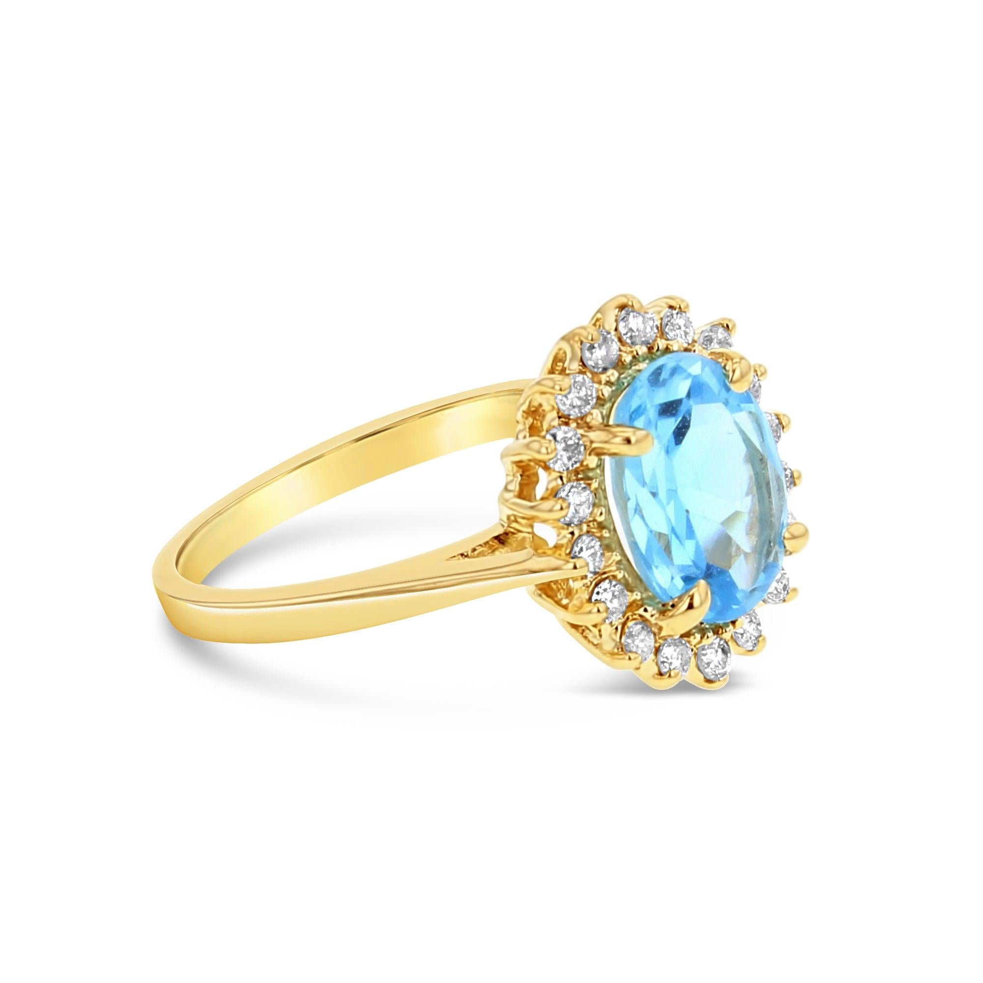 Taglio rotondo Anello aureola con diamante e topazio blu in vendita