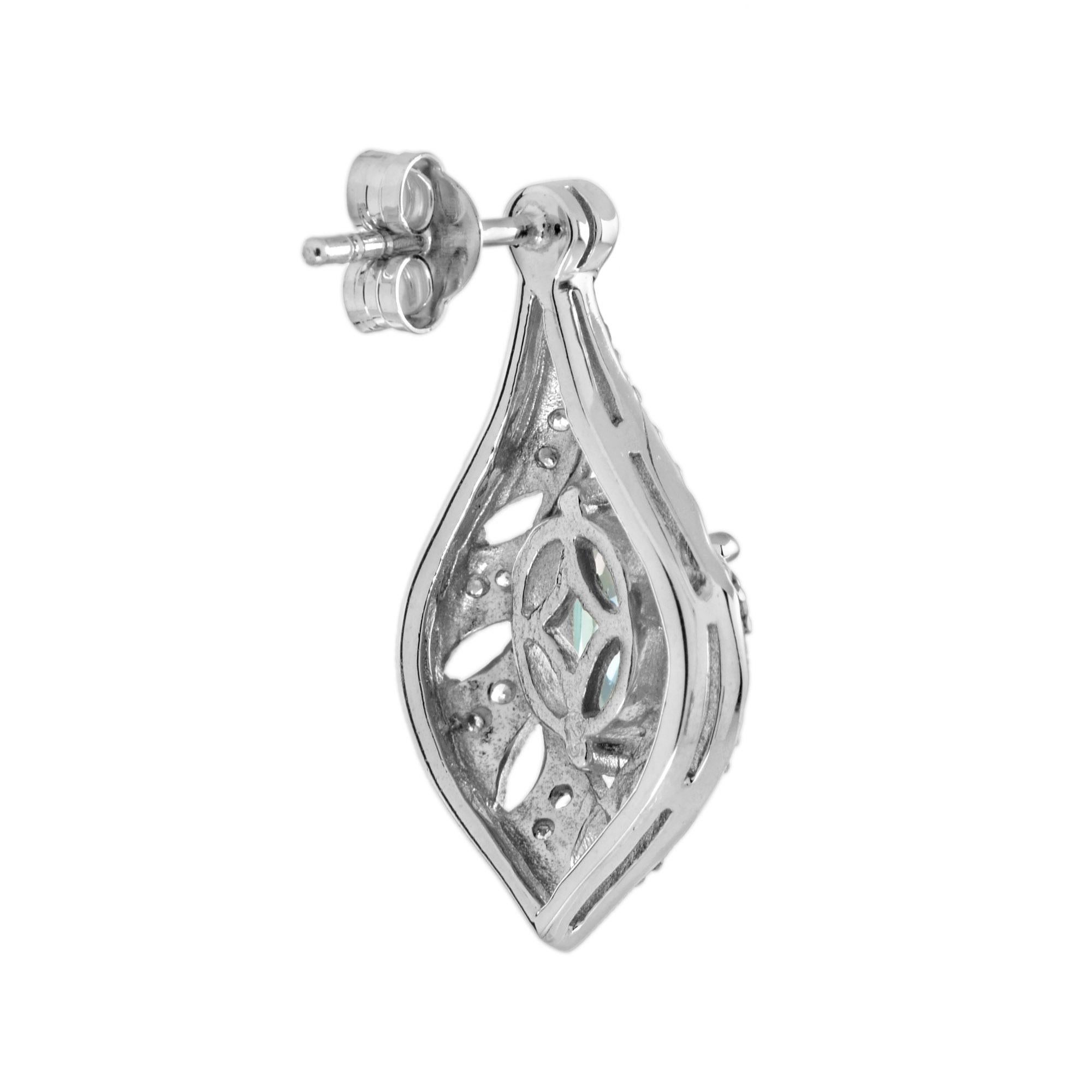 Taille ovale Boucles d'oreilles pendantes en or blanc avec topaze bleue et diamant en forme de cadre ajouré de style Art déco en vente