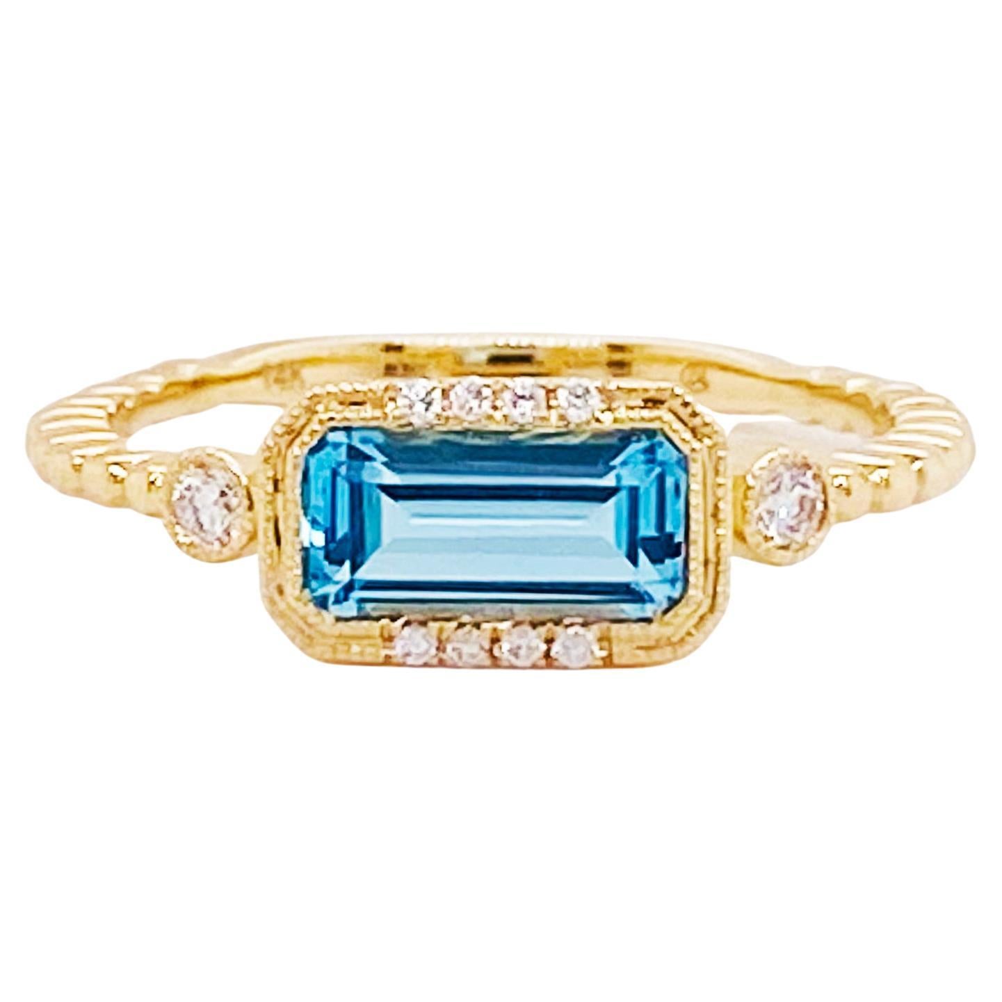 For Sale:  Blue Topaz Diamond Ring 14K Gold Emerald Cut Topaz Modern Ring, East to West