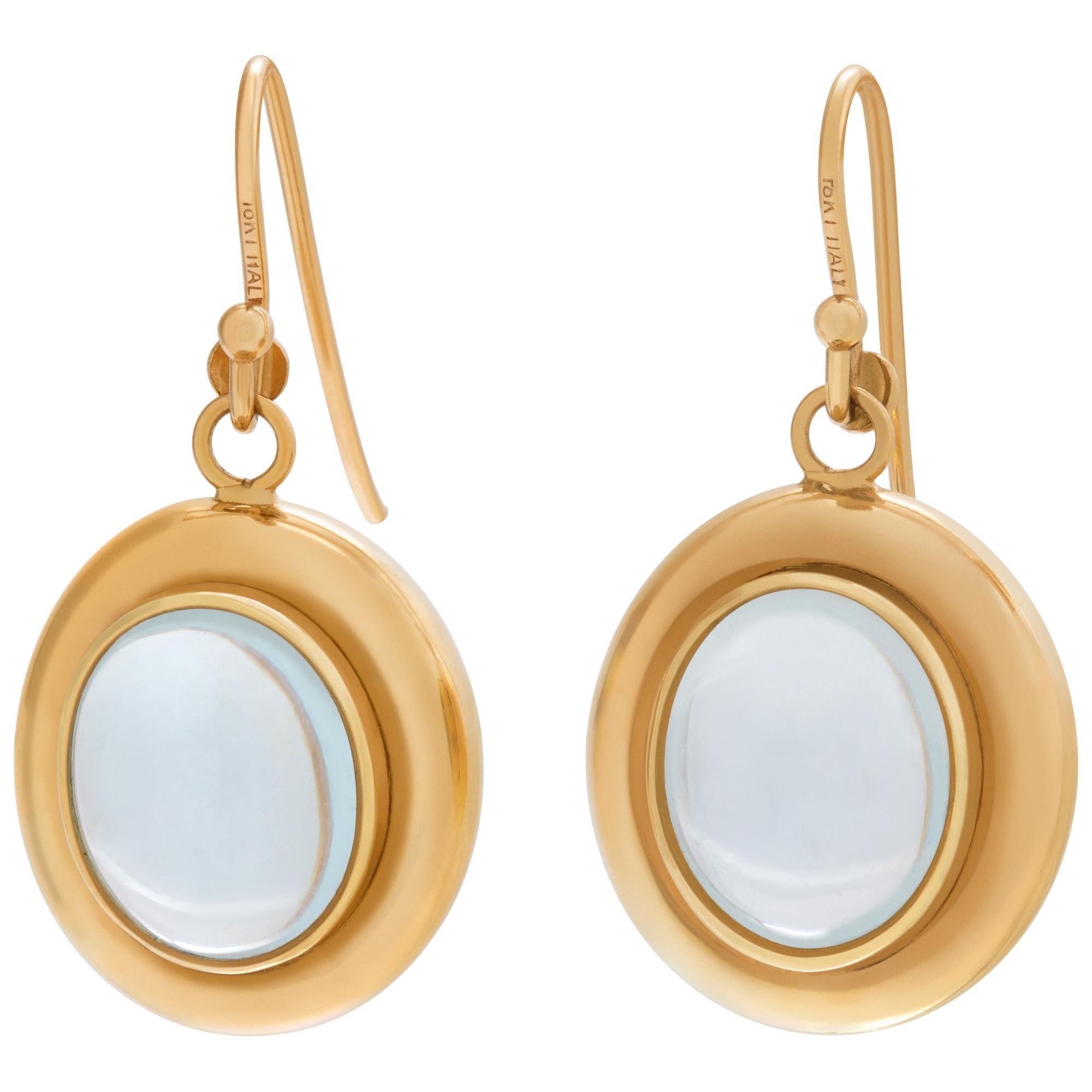 Cabochon Blue Topaz earrings set in 14k yellow gold. Hanging length is 25 mm.
