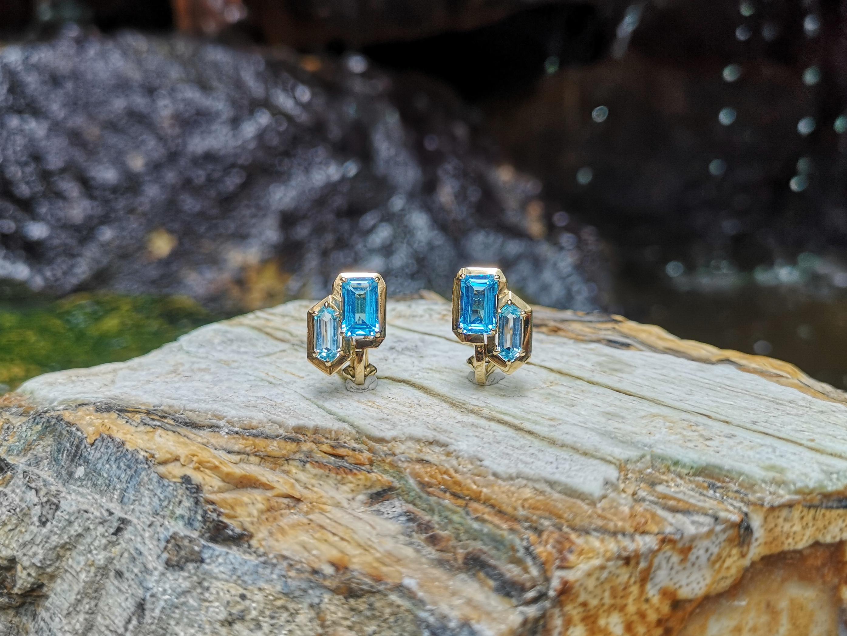 Emerald Cut Blue Topaz Earrings Set in 18 Karat Gold by Kavant & Sharart For Sale