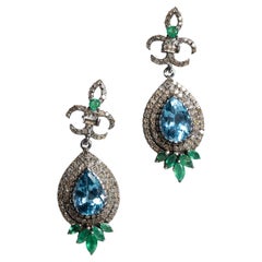 Pendientes de gota de topacio azul, esmeralda y diamante