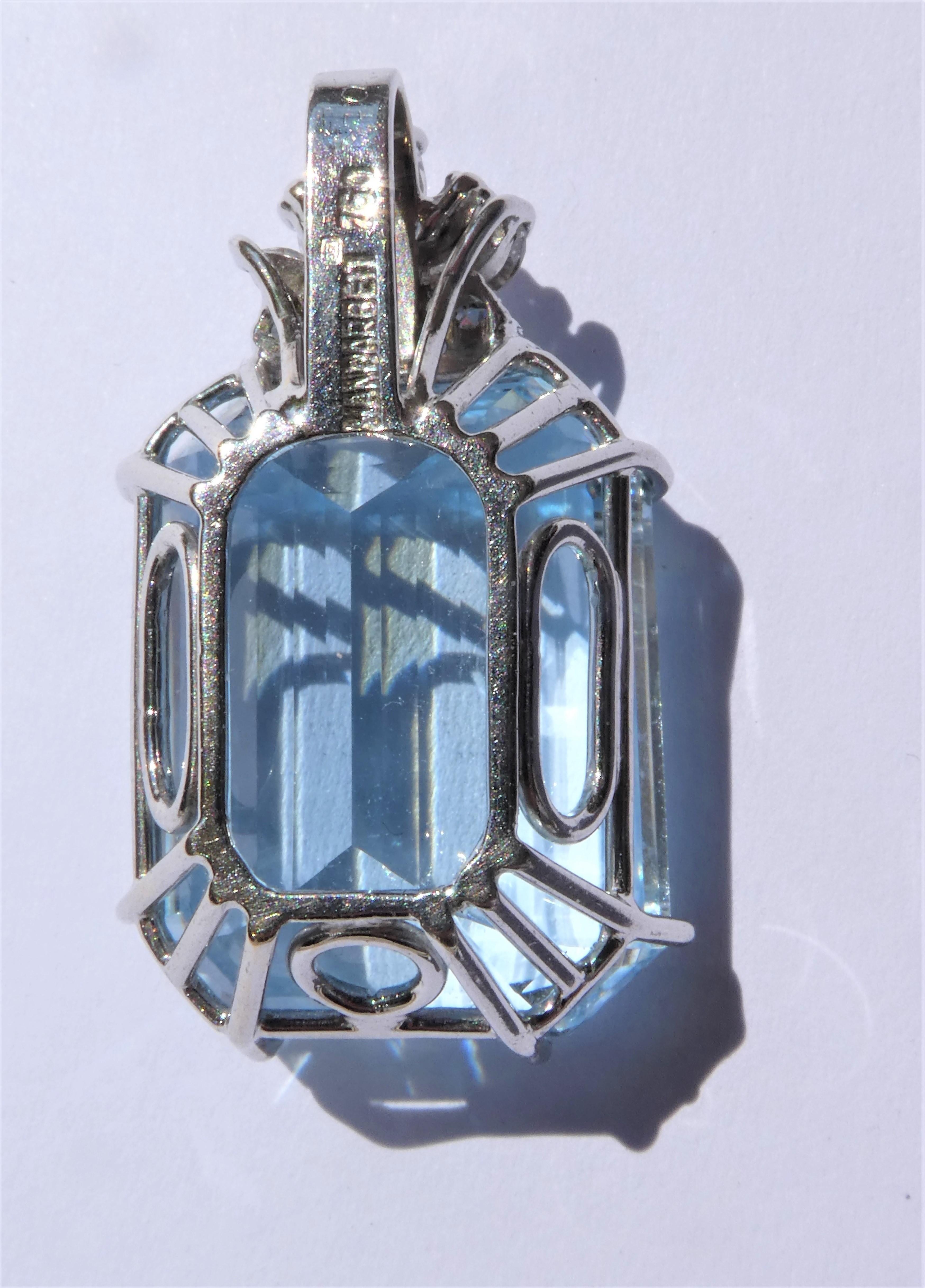 Contemporary Blue Topaz Emerald Cut 18 Karat White Gold Diamonds Pendant For Sale