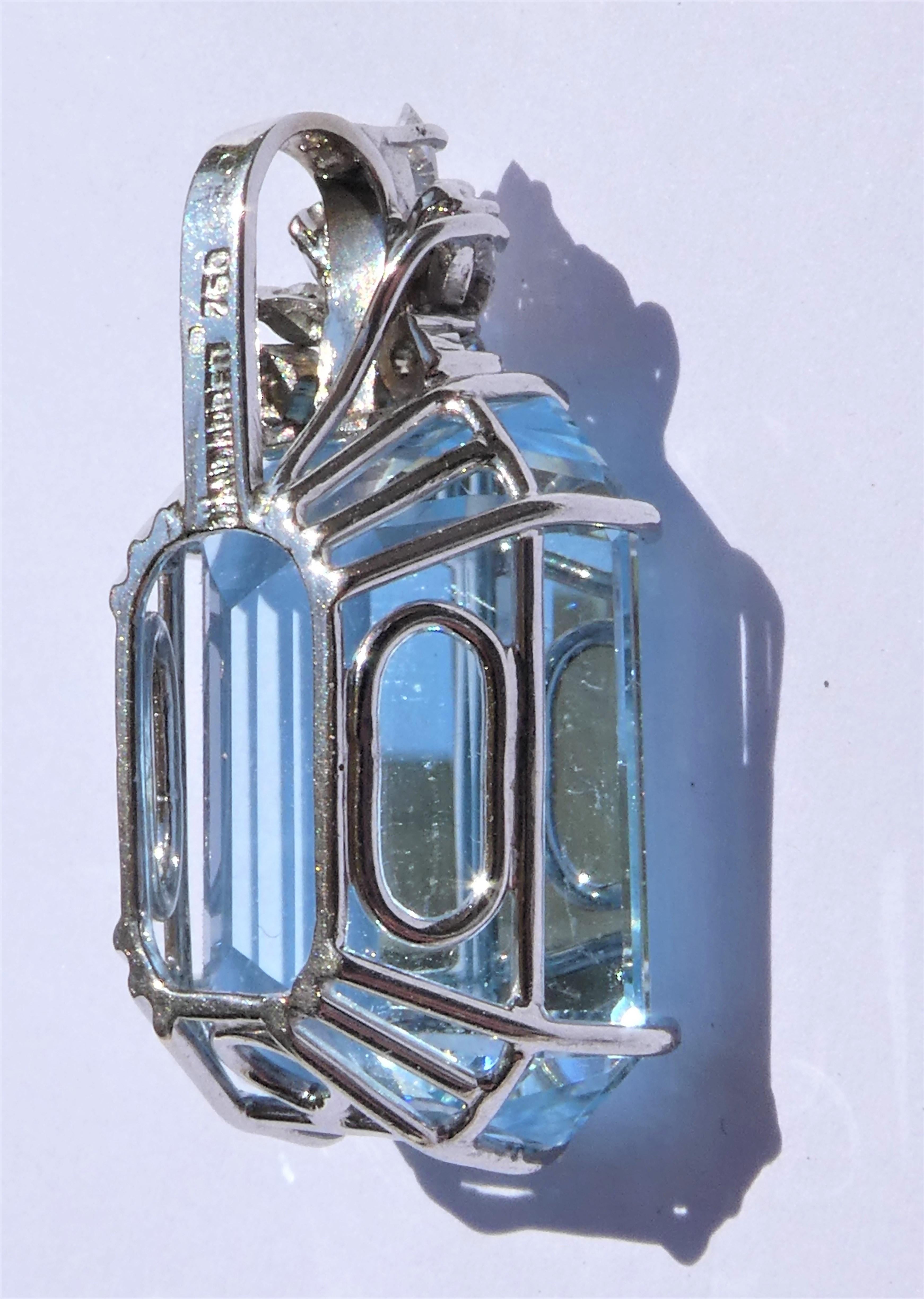 Women's Blue Topaz Emerald Cut 18 Karat White Gold Diamonds Pendant For Sale