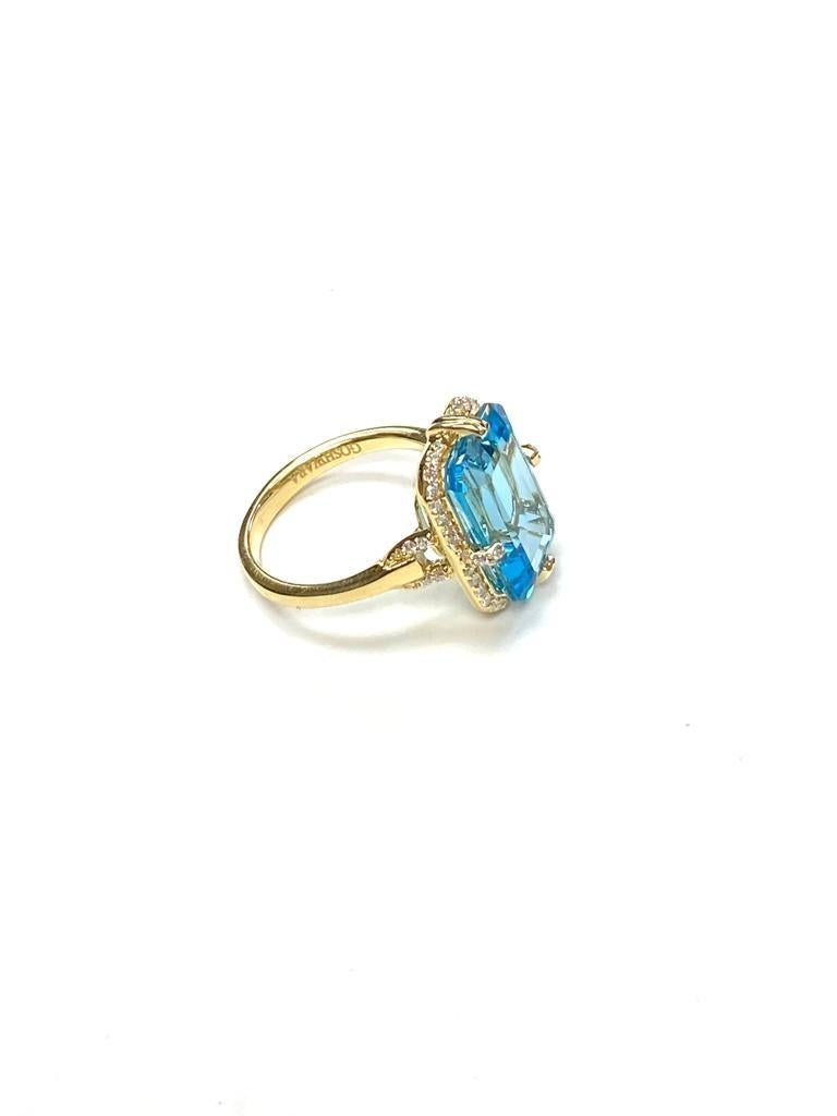 Contemporain shwara (laque à papier)  Bague en topaze bleue taille émeraude et diamants en vente