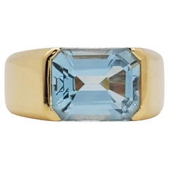 Blue Topaz Emerald Cut Ring in 18k Yellow Gold