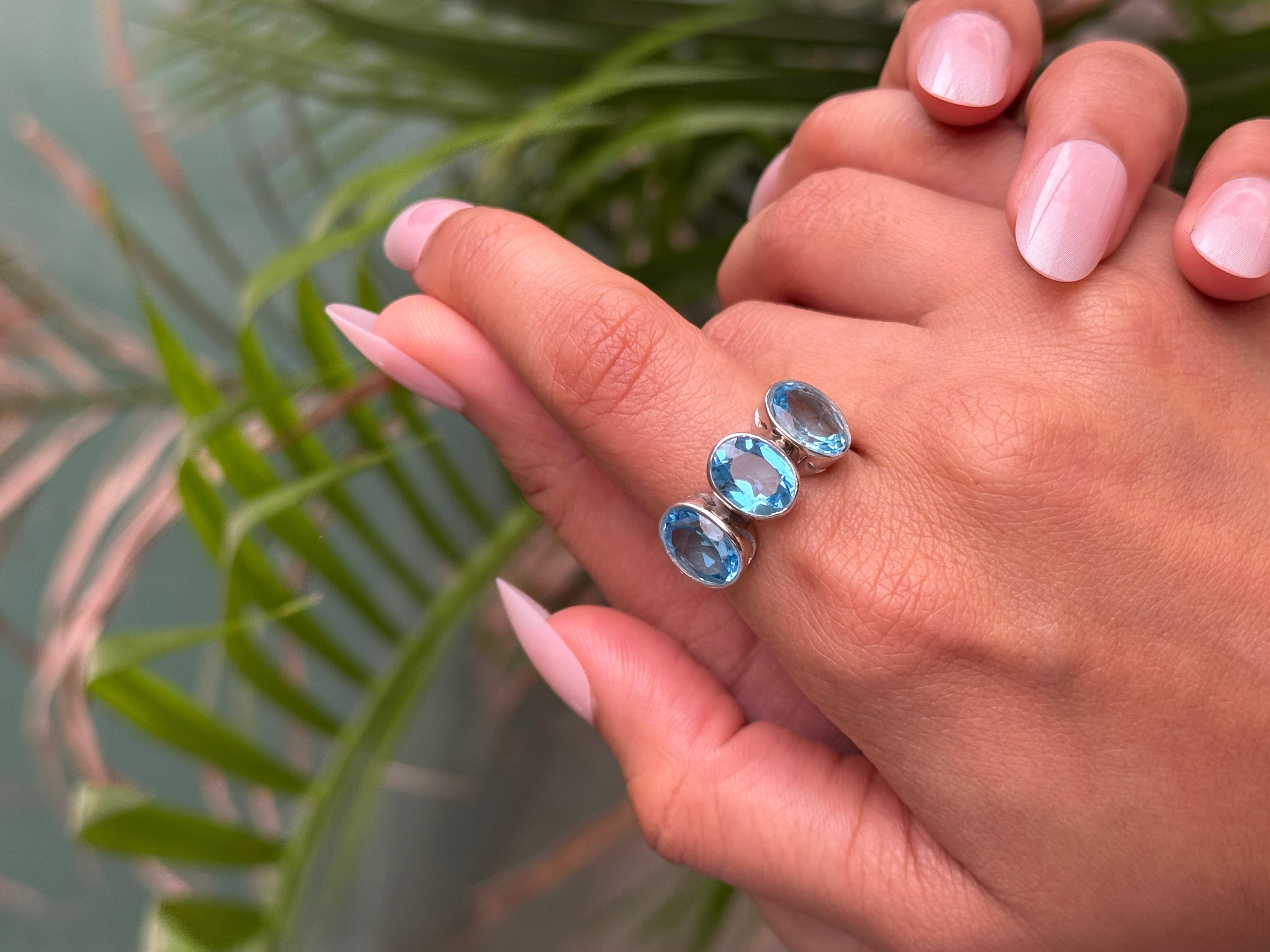 in vendita:  Anello unisex sfaccettato con triplo topazio blu per lui in A. Silver 925 6