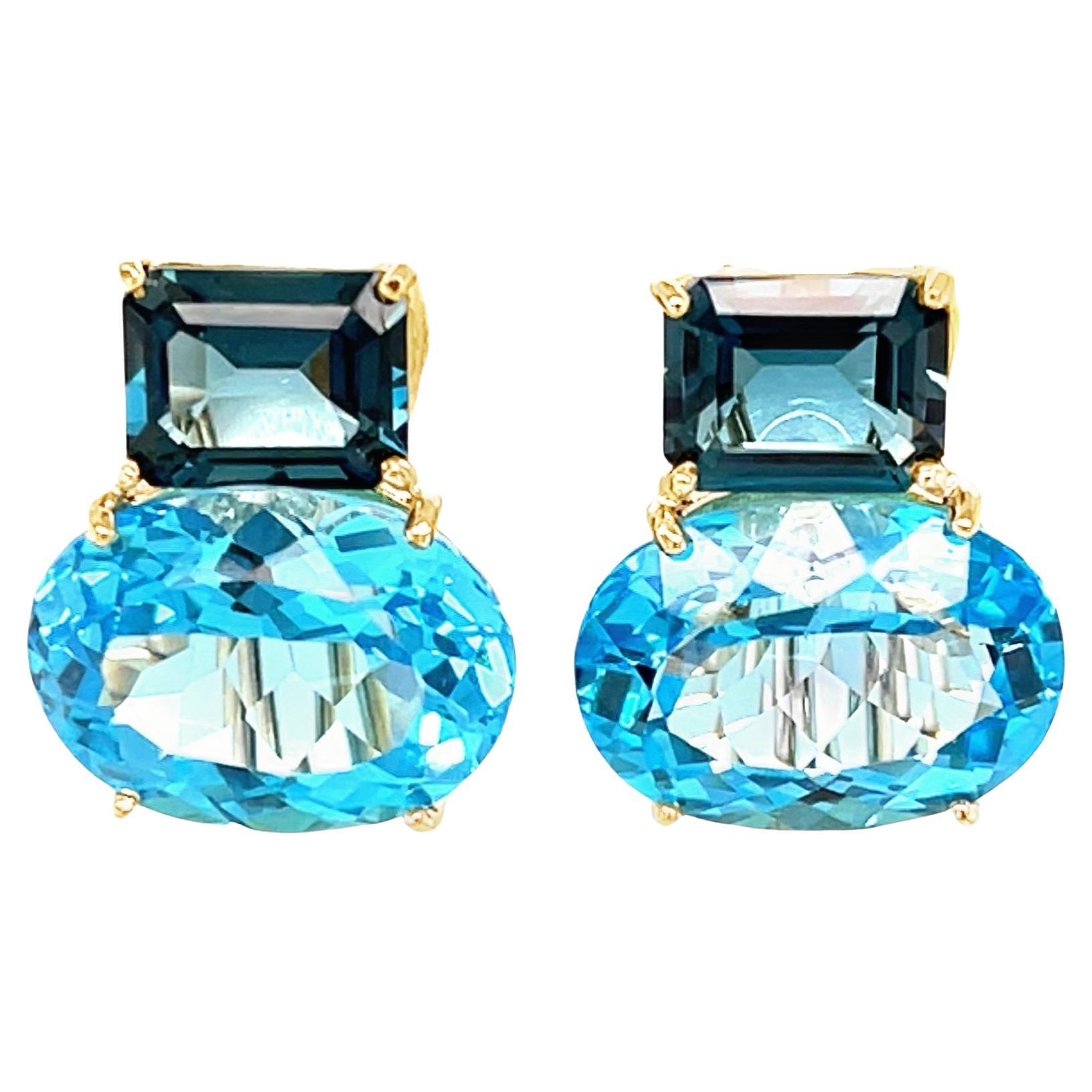 Orecchini a clip in oro giallo 18 carati con topazio blu, 28,49 carati totali
