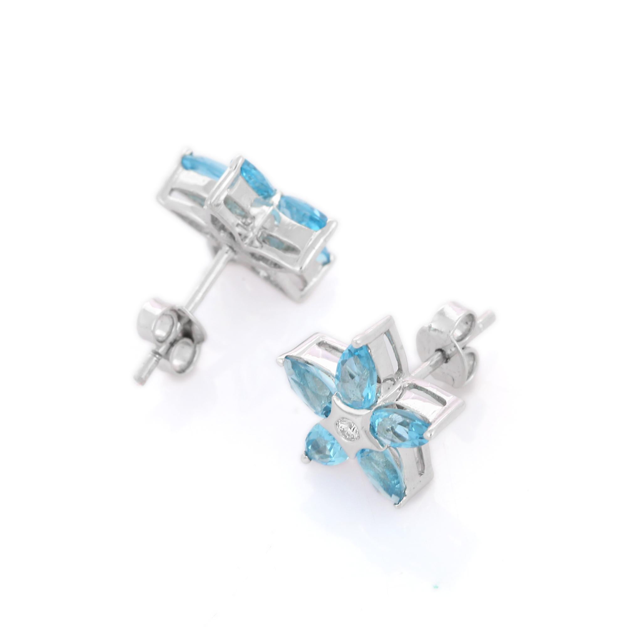 Romantic Blue Topaz Gemstone Flower Stud Earrings with Diamond in 18K White Gold For Sale