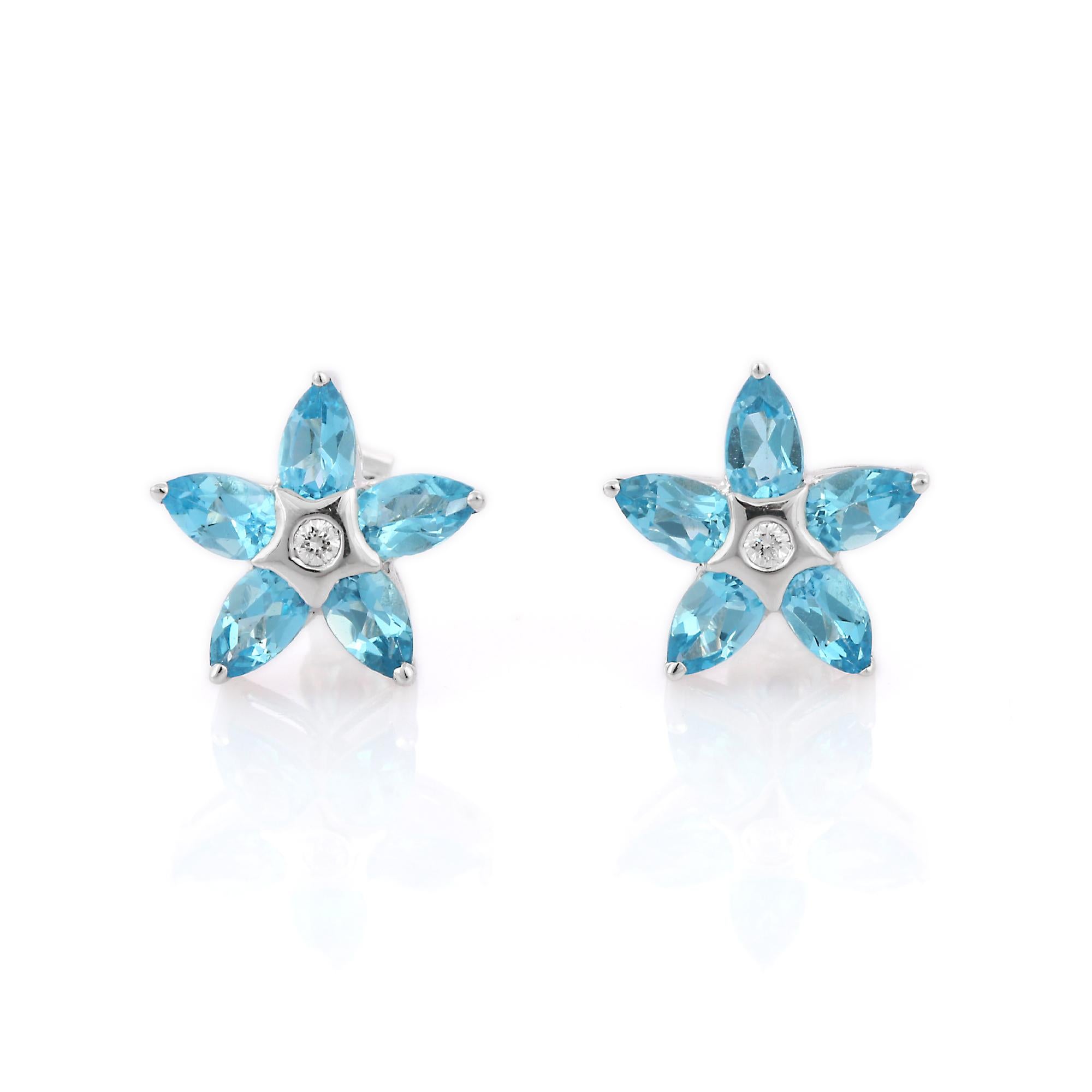 Pear Cut Blue Topaz Gemstone Flower Stud Earrings with Diamond in 18K White Gold For Sale
