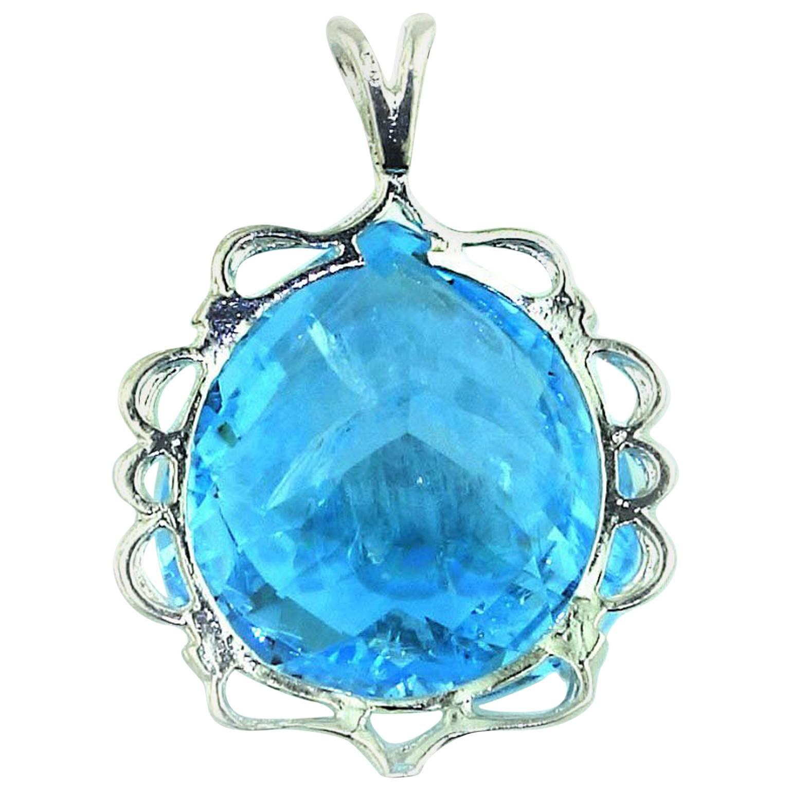 Huge 78 carat sparkling Blue Topaz in Sterling Silver Pendant.  This is a fat pear shape gemstone with a checkerboard table, the natural inclusions add to the sparkle.  We found this fabulous one of a kind in Belo Horizonte, Minas Gerais, Brazil