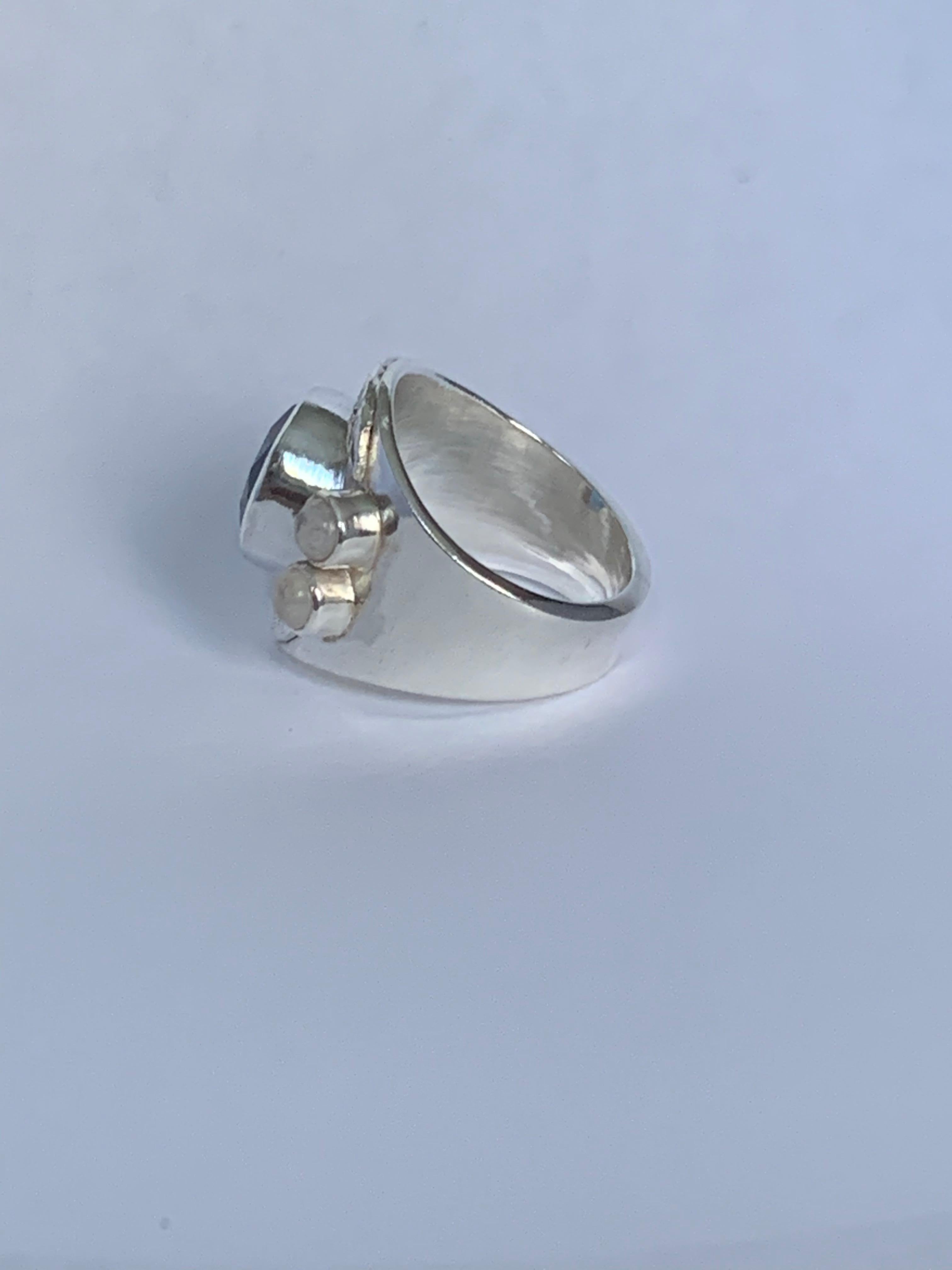 Mixed Cut Blue Topaz and Moon Stone Ring Set in Sterling Silver For Sale