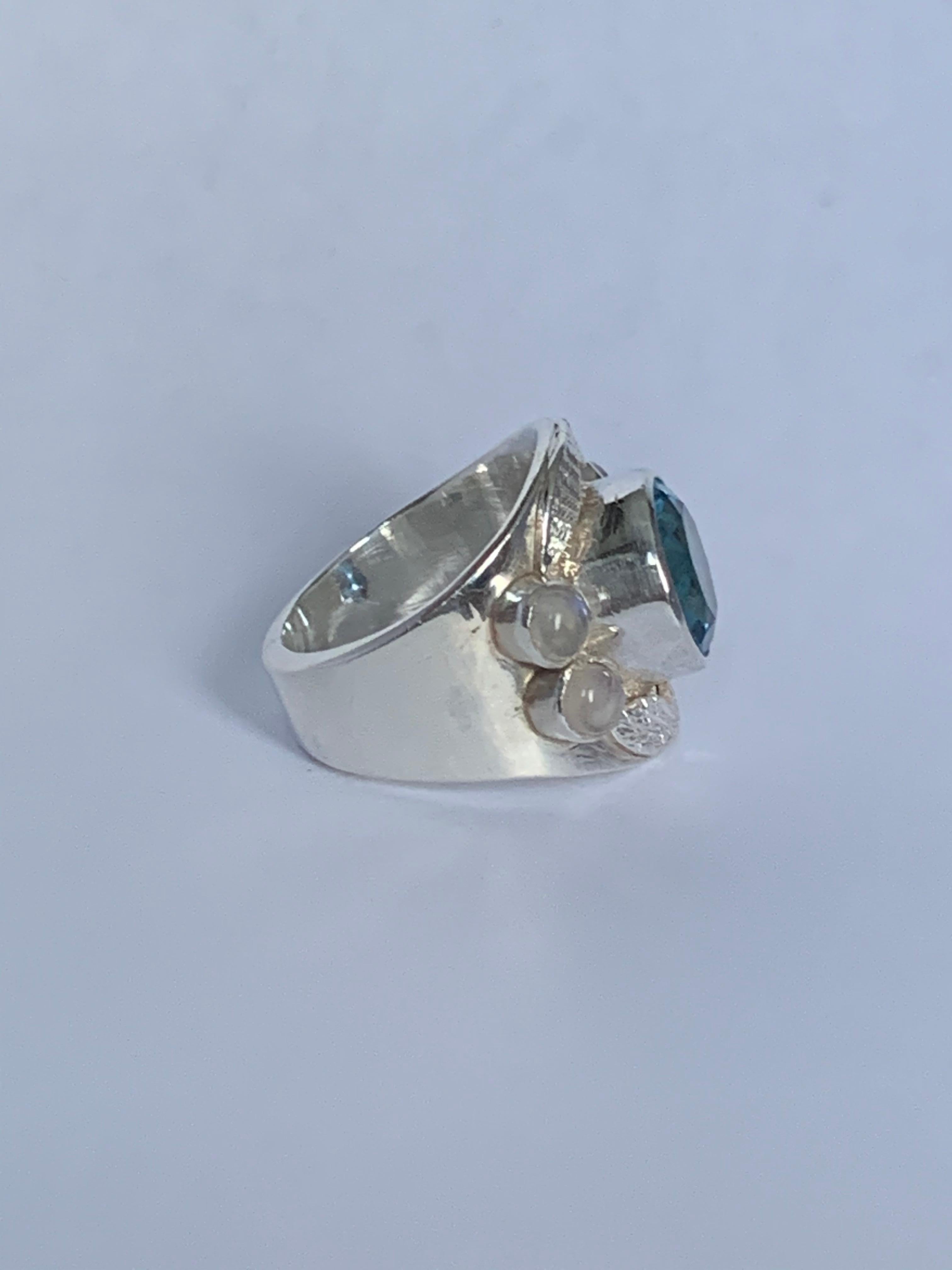 Women's Blue Topaz and Moon Stone Ring Set in Sterling Silver For Sale
