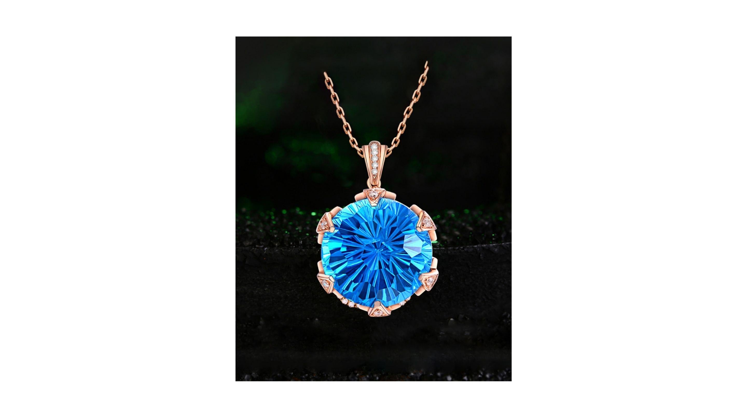 
Unique Blue Topaz Necklace at 1.608ct  set in 18k rose gold and really stands out with accent stones.   Very elegant and will make a ideal gift  
