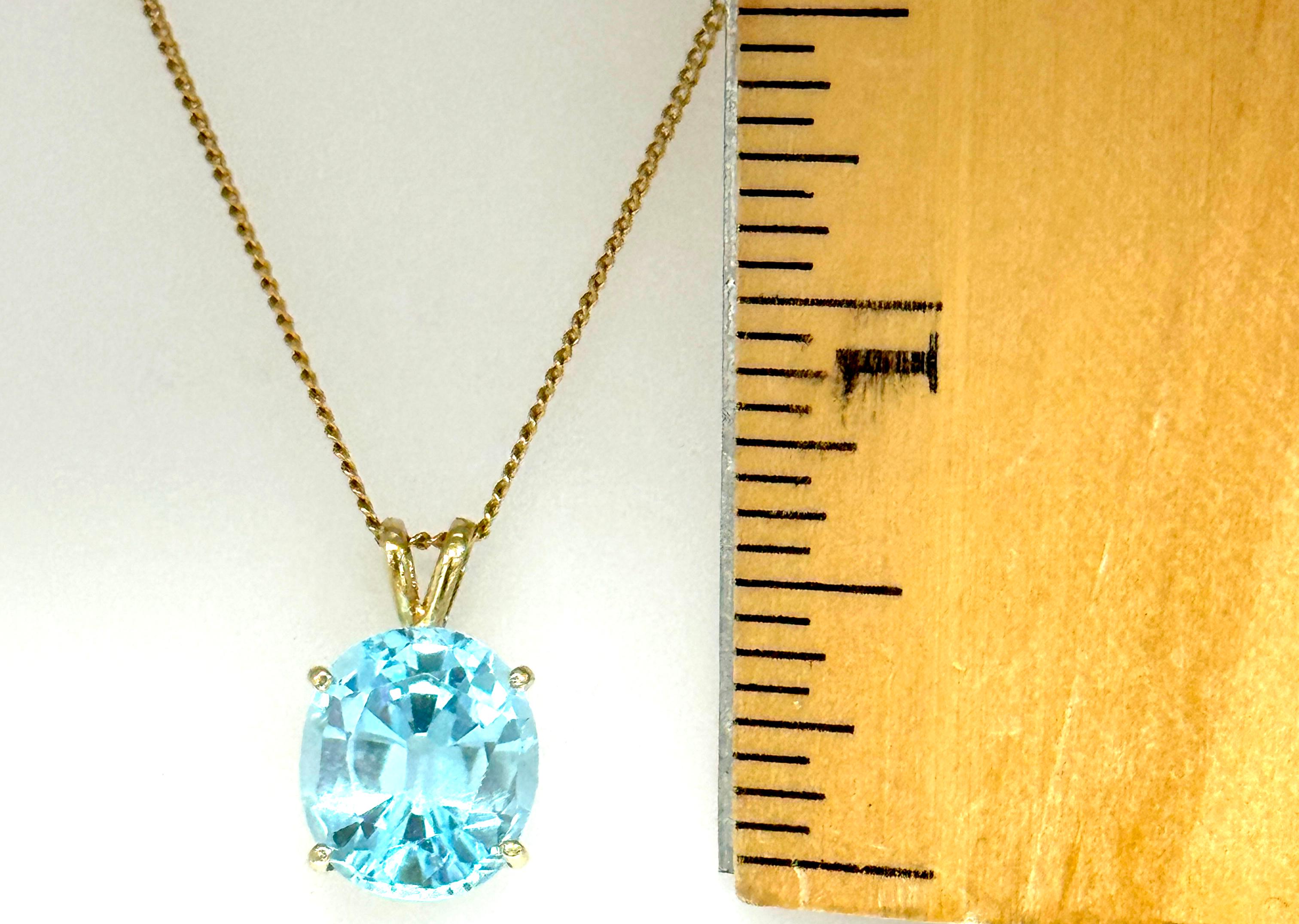 Collier pendentif en or jaune 14 carats avec topaze bleue ovale 6 carats et pierre de naissance 6 carats Excellent état - En vente à Dearborn, MI