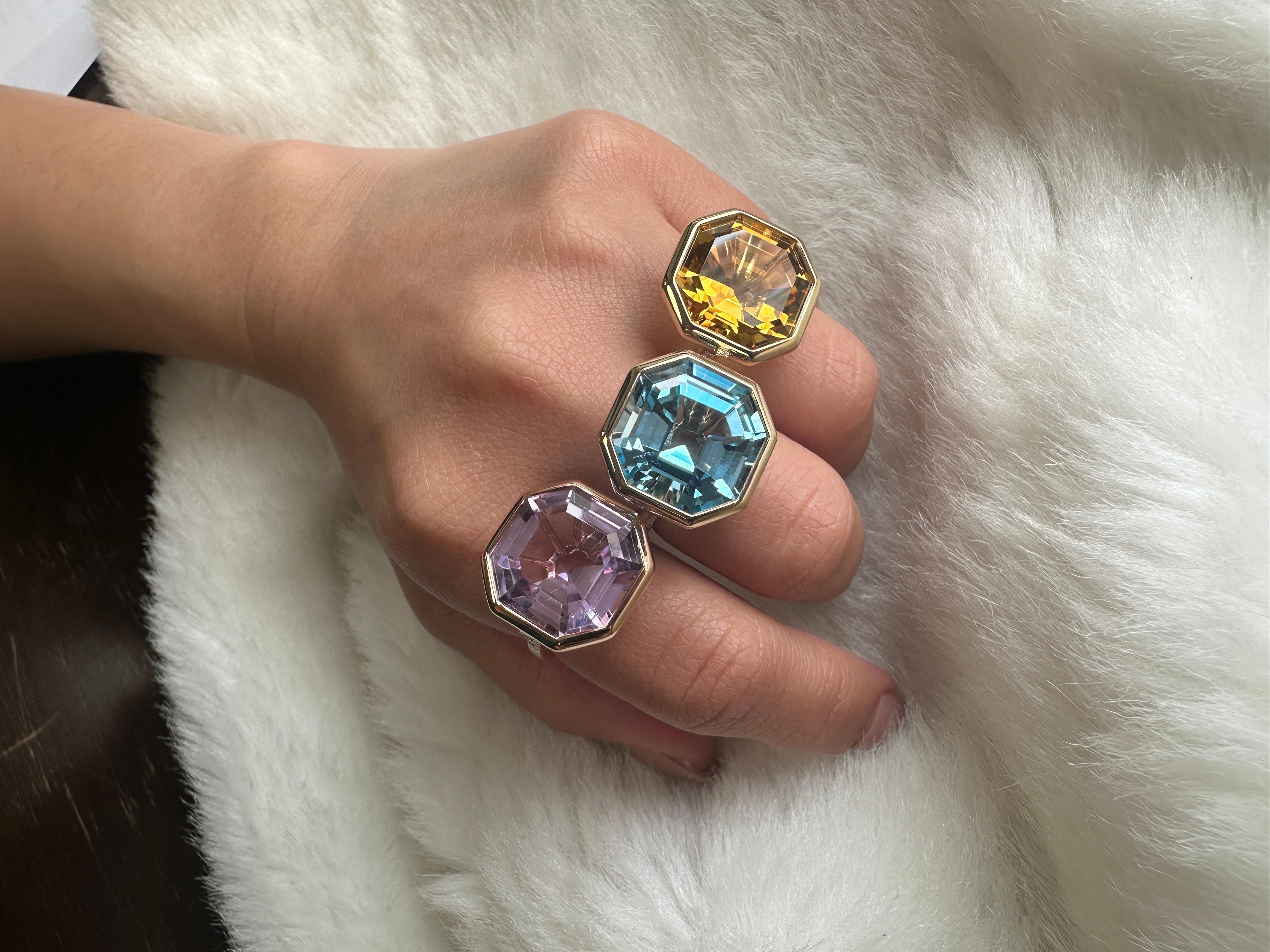 En vente :  Bague octogonale en or jaune 18 carats avec topaze bleue et diamants 5