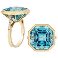 Bague octogonale en or jaune 18 carats avec topaze bleue et diamants
