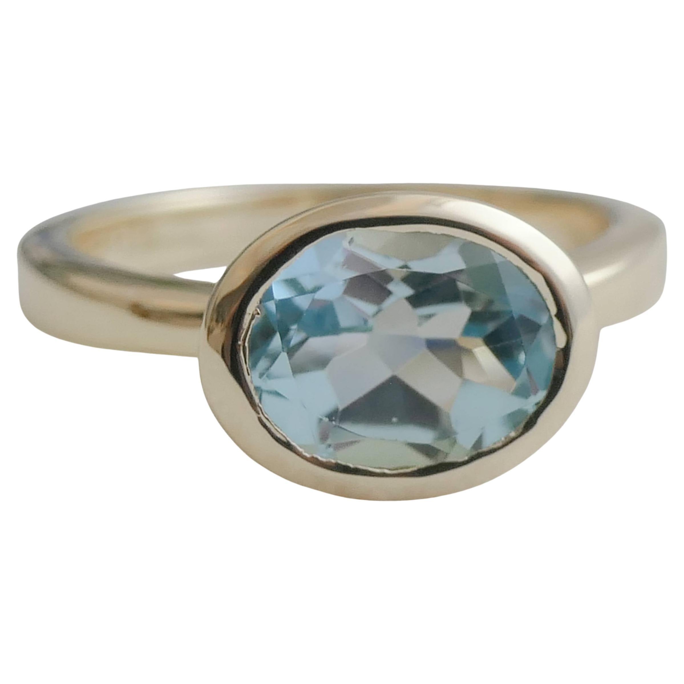 Blue Topaz Oval Gold Plated Sterling Silver Ring