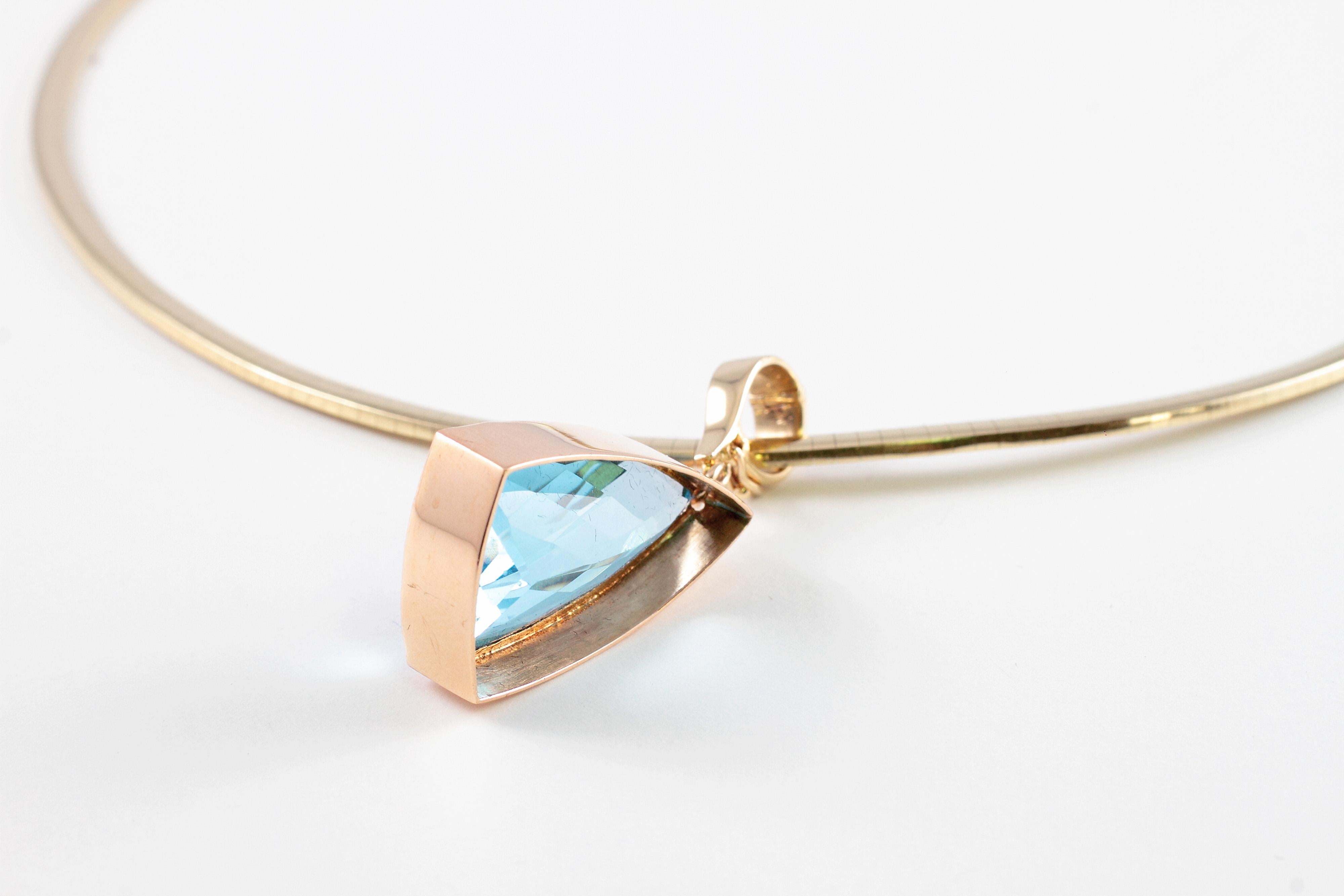 Women's Blue Topaz Pendant on 14 Karat Yellow Gold Omega Necklace