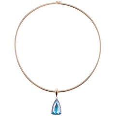 Blue Topaz Pendant on 14 Karat Yellow Gold Omega Necklace