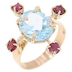 Anello in oro rosa Topazio Blu e Rubini Rossi Botta Gioielli