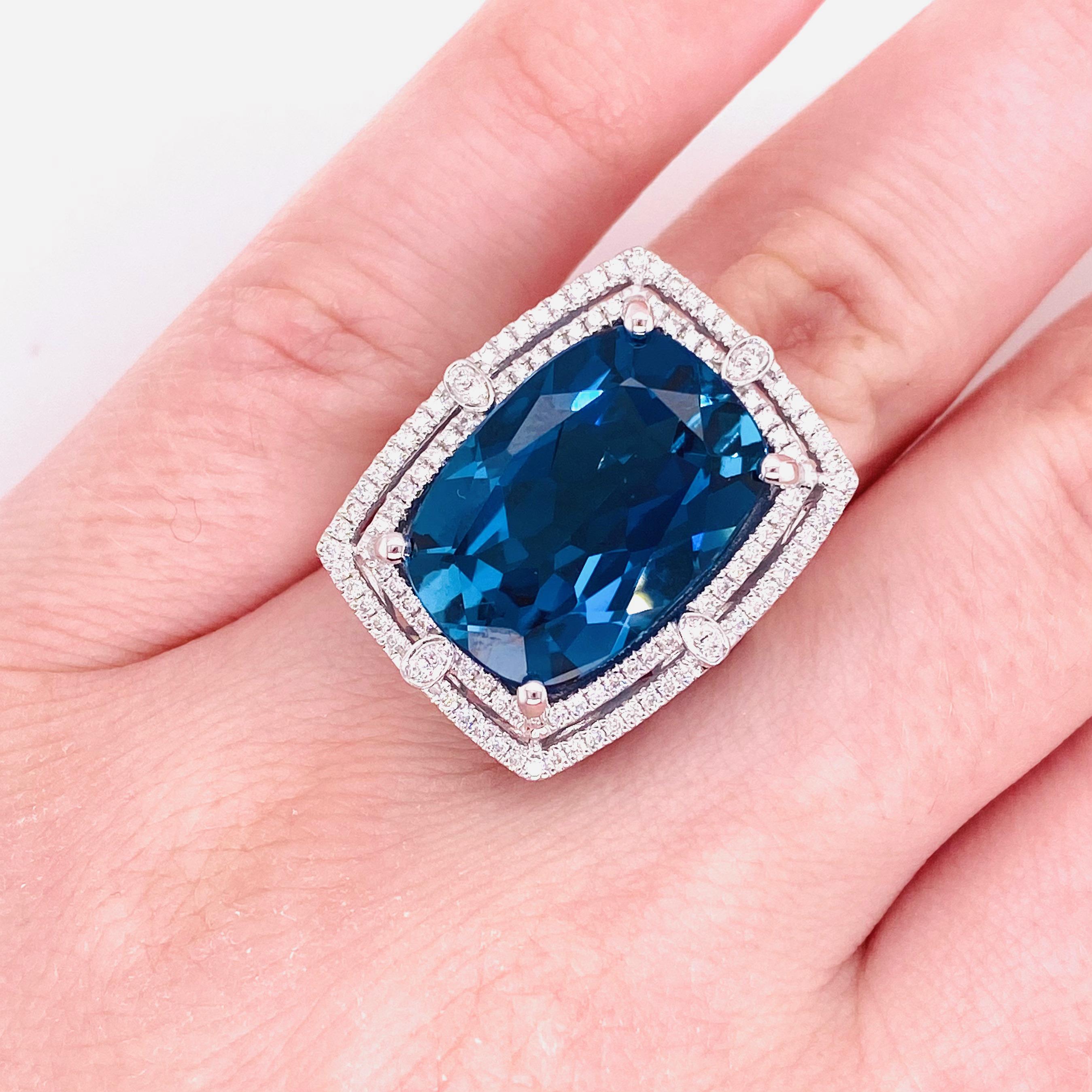 This 16.11 carat ocean blue topaz is an amazing site to see!  Her cushion cut and her royal blue color is absolutely gorgeous!  You will not believe the size and brilliance of this genuine gemstone!  There is an edge of diamonds on all the sides and