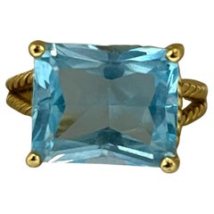 Bague en or jaune massif avec topaze bleue et anneau en forme de corde Taille 6