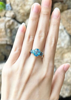 Blue Topaz Ring set in 14K Gold Settings