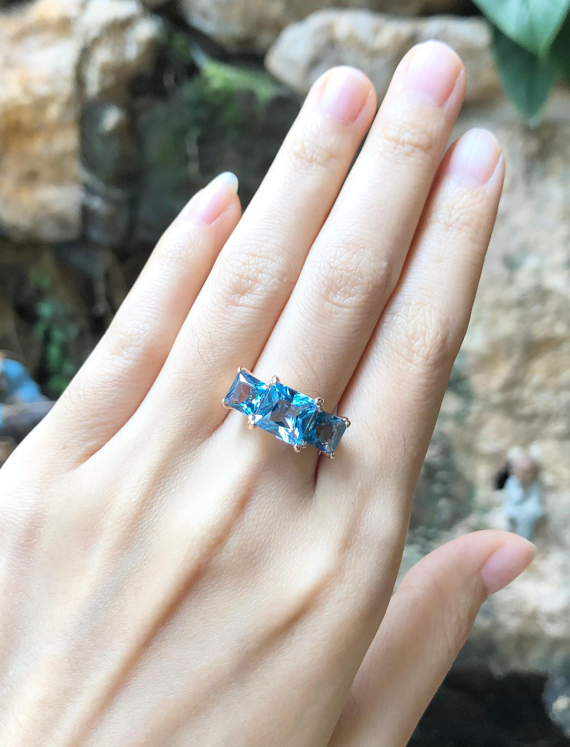 Blue Topaz 5.87 carats Ring set in 18 Karat Rose Gold Settings

Width:  2.1 cm 
Length: 1.0 cm
Ring Size: 53
Total Weight: 8.23 grams

