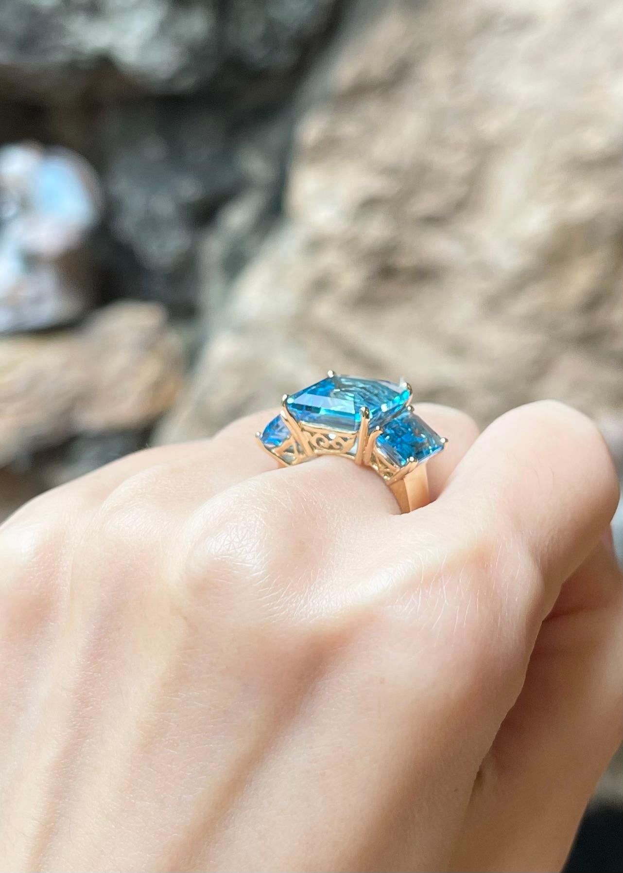Women's Blue Topaz Ring set in 18K Gold Settings For Sale