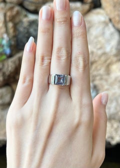 Blue Topaz Ring set in 18K White Gold Settings