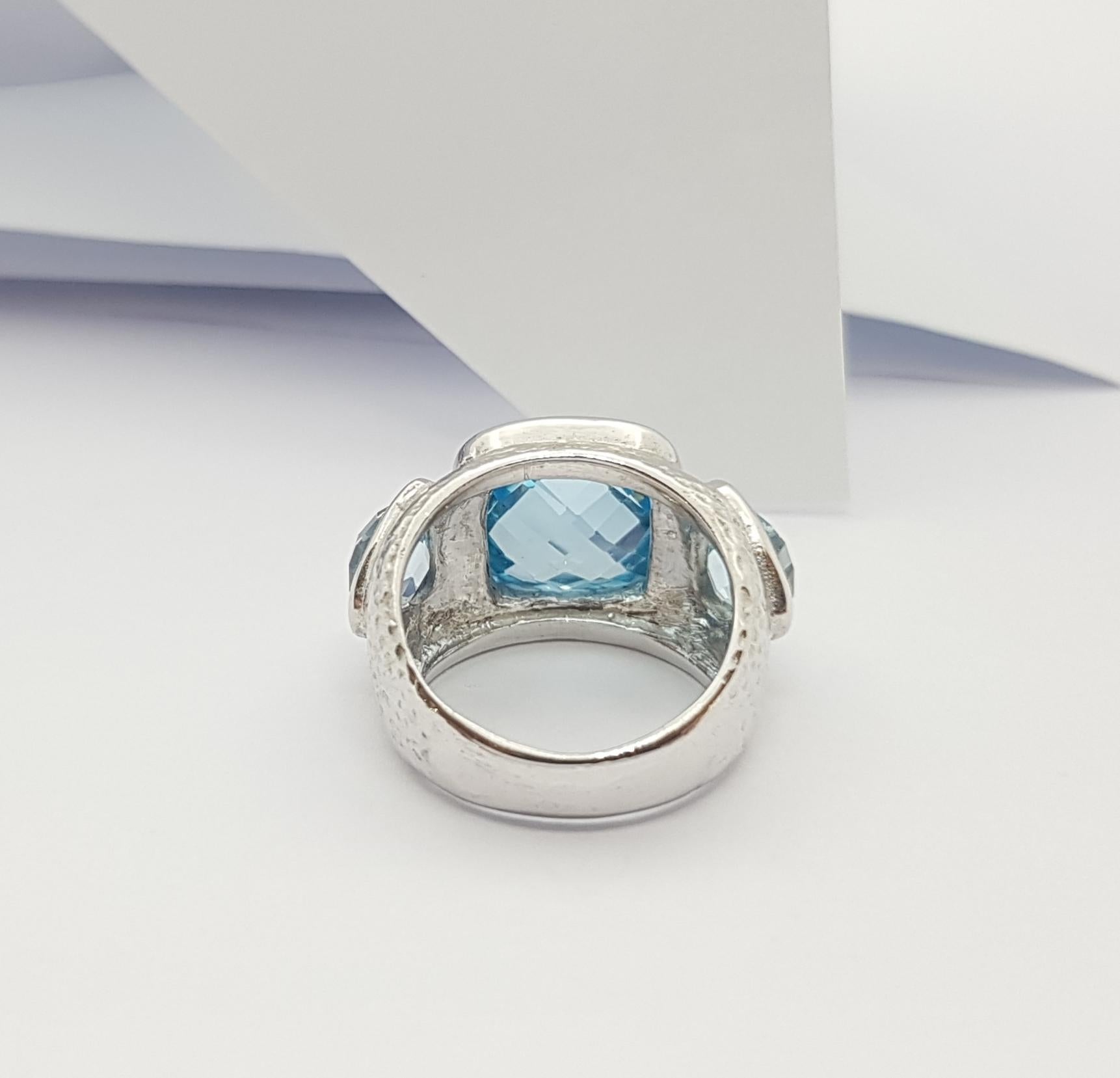 Women's or Men's Blue Topaz Ring set in Silver Settings For Sale
