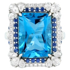 Blue Topaz Ring With Sapphires and Diamonds 13.14 Carats 18K White Gold