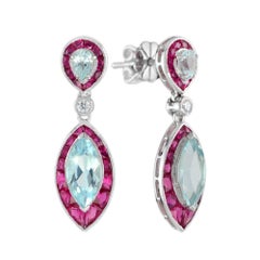 Boucles d'oreilles pendantes en or blanc 14 carats, topaze bleue, rubis et diamants en forme de marquise
