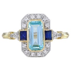 Blue Topaz Sapphire and Diamond Art Deco Style Engagement Ring in 14K Yellow Gol