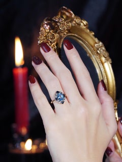 Blue Topaz Sapphire and Diamond Art Deco Style Halo Ring in 9K Yellow Gold