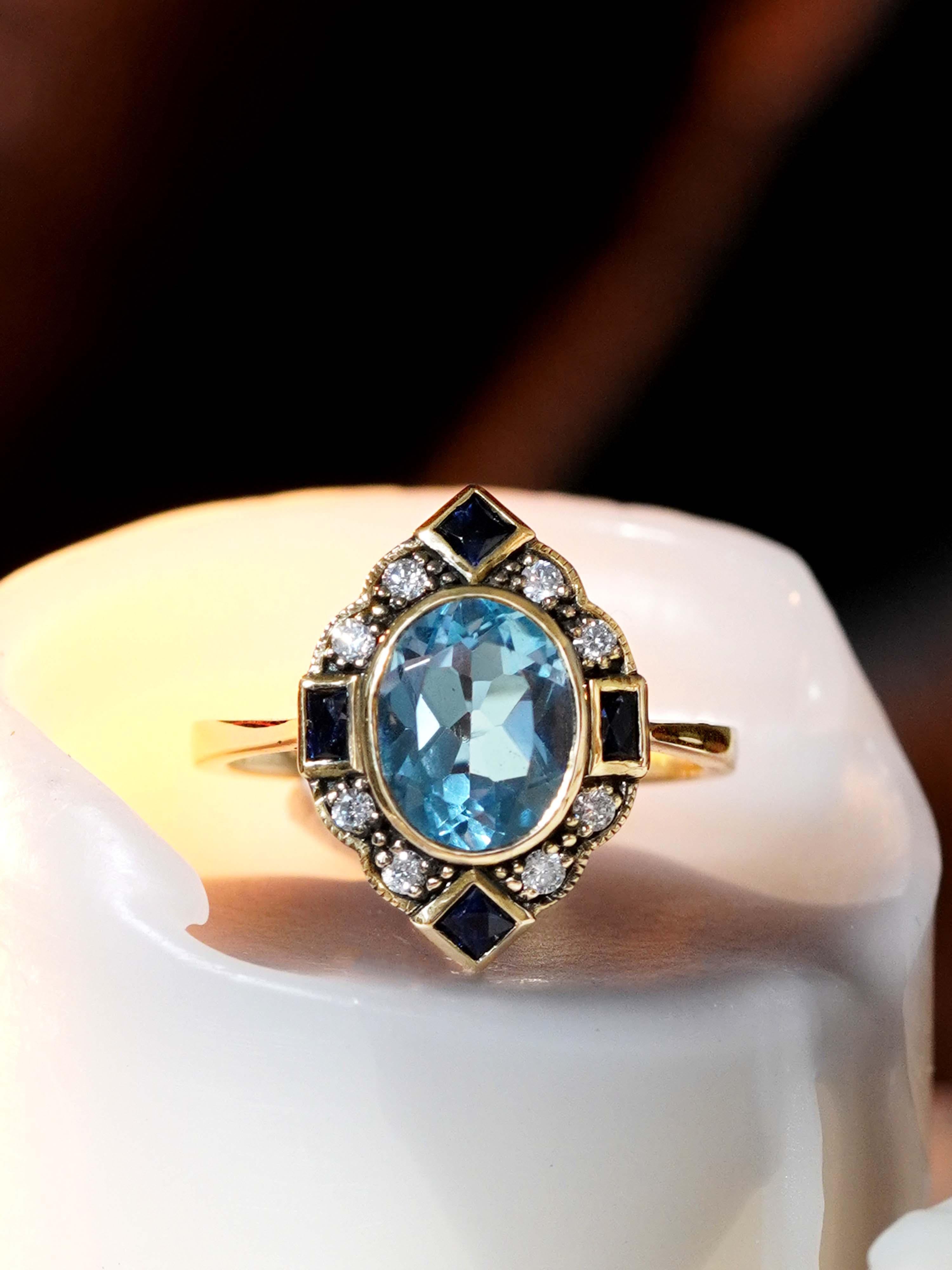 Art déco Bague Halo en or jaune 9K, topaze bleue, saphir et diamant de style Art Déco en vente