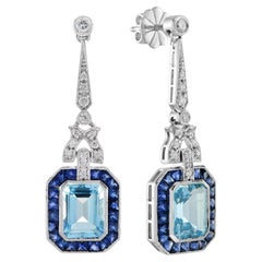 Boucles d'oreilles pendantes en or blanc 14 carats Topaze bleue et saphir Diamant de style Art Déco