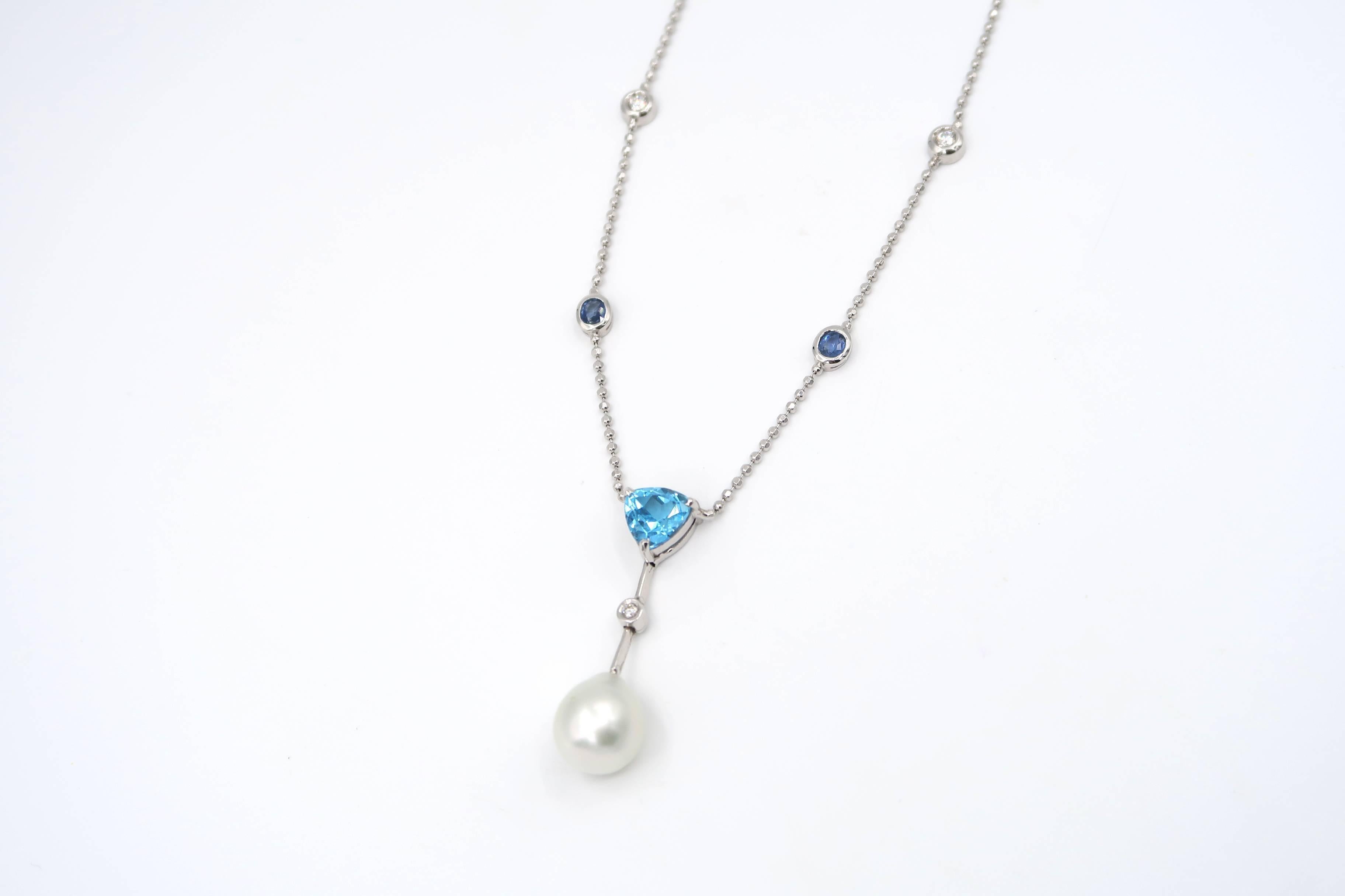 Blue Topaz South Sea Pearl Diamond Sapphire 18K White Gold Chain Drop Adjustable Necklace

Gold: 18K White Gold, 7.20 g
Diamond: 0.24 ct
Blue Topaz: 1.89 ct
Sapphire: 0.30 ct
South Sea Pearl: Drop, Silvery White

Approx. 16