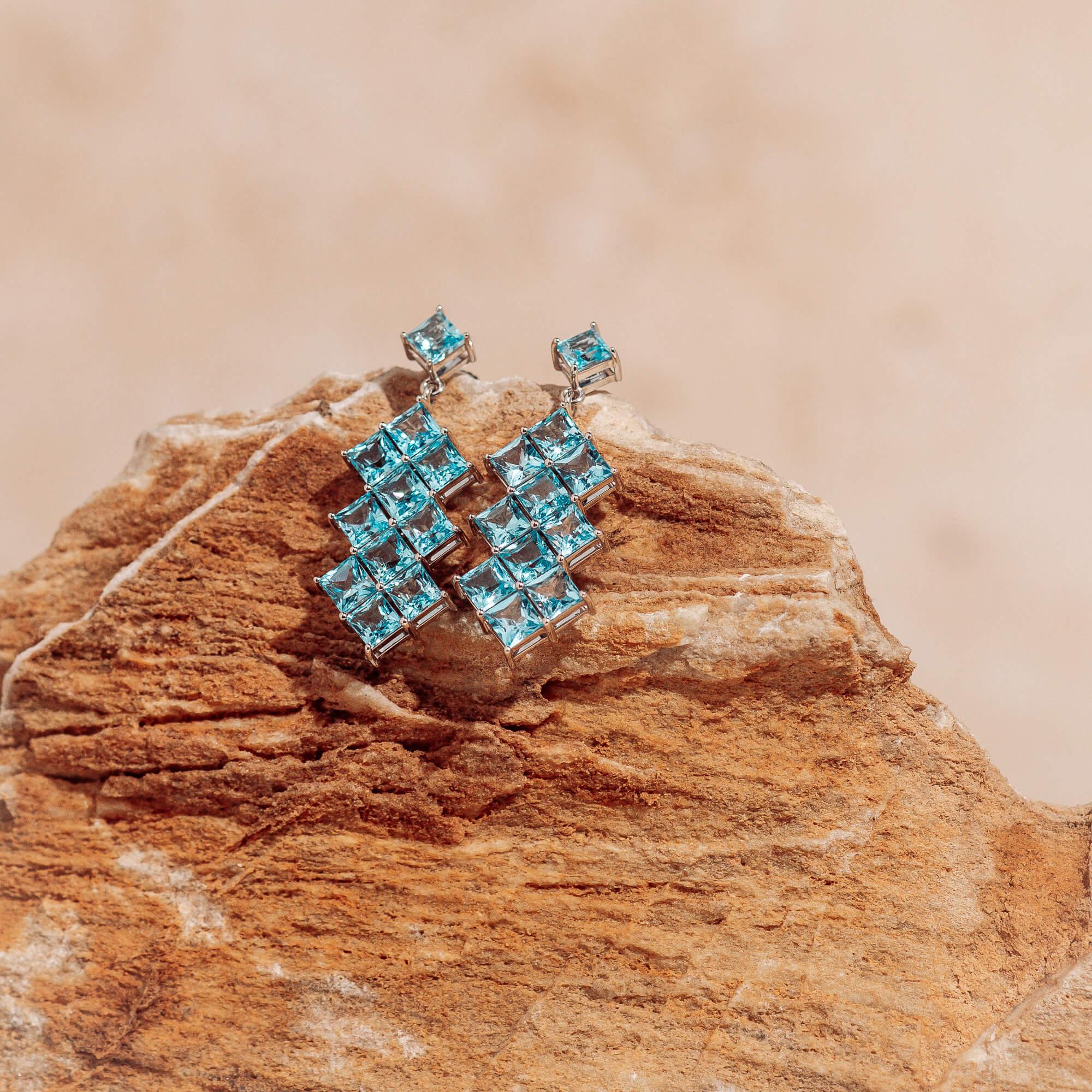22 sky blue topaz princess cuts grace these eye catching, white gold, drop earrings. They were chosen for the Artist Exhibit during Milano Jewelry Week 2024.
22 princess cut sky blue topaz - 10.42 ctw
posts
These dramatic drop earrings capture the