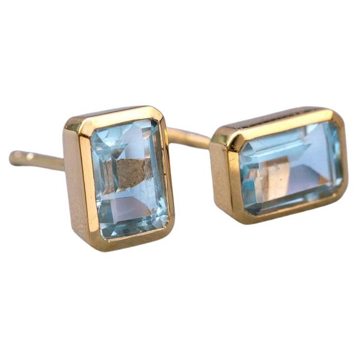 Blue Topaz Stud Earrings 14K Yellow Gold Emerald Cut