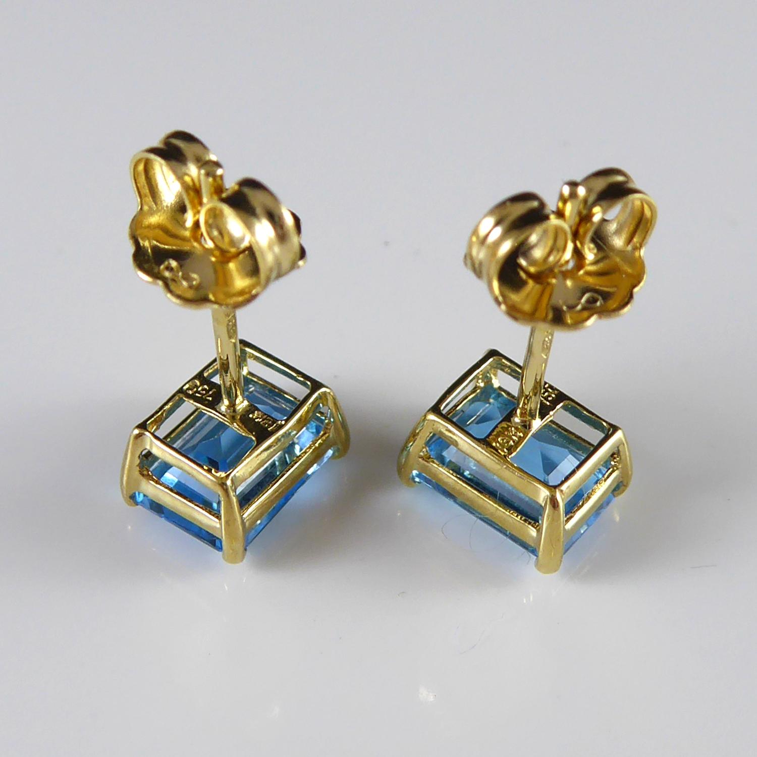 Women's Blue Topaz Stud Earrings in Yellow Gold