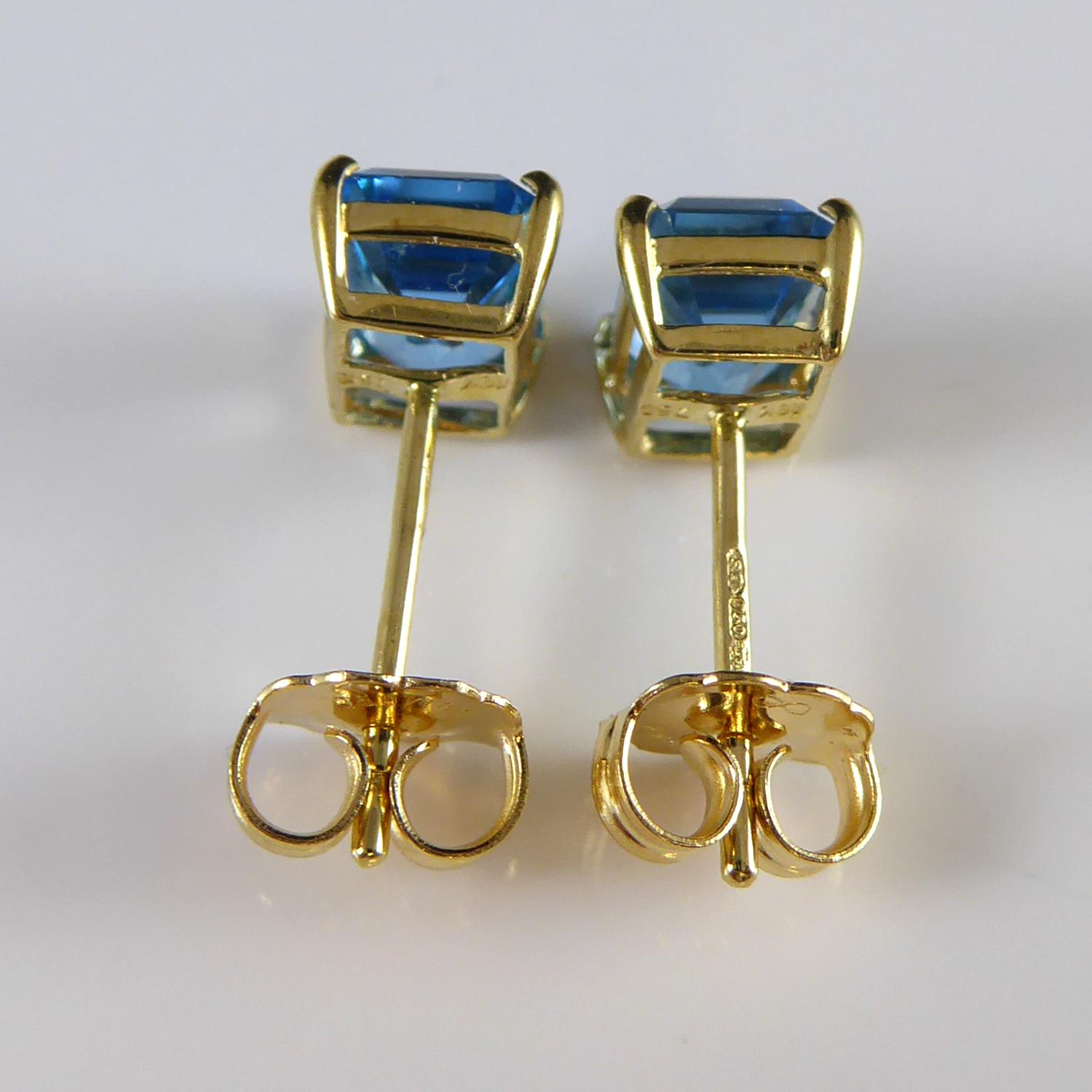 Blue Topaz Stud Earrings in Yellow Gold 1