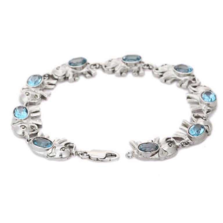 Blue Topaz Studded Sterling Silver Elephant Bracelet for Women In New Condition For Sale In Houston, TX